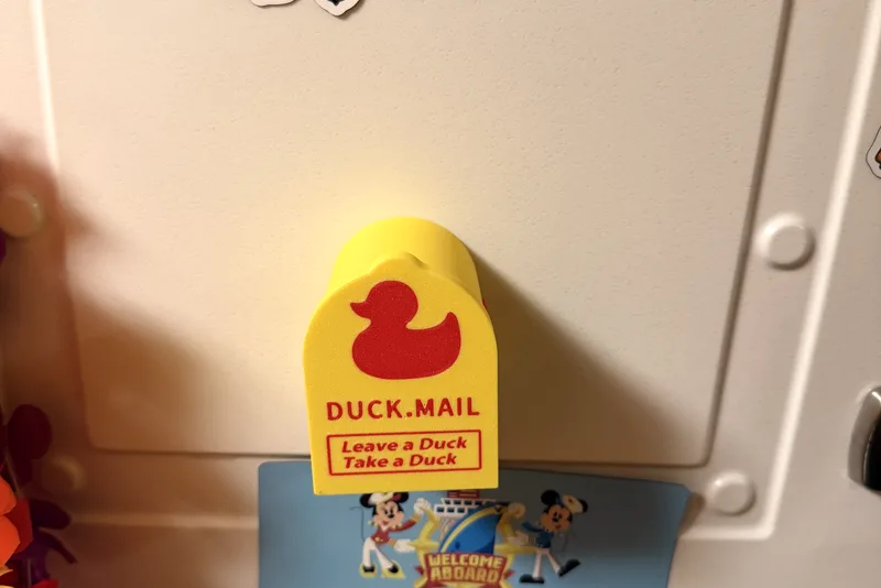 Duck mail station mounted on a cabin door
